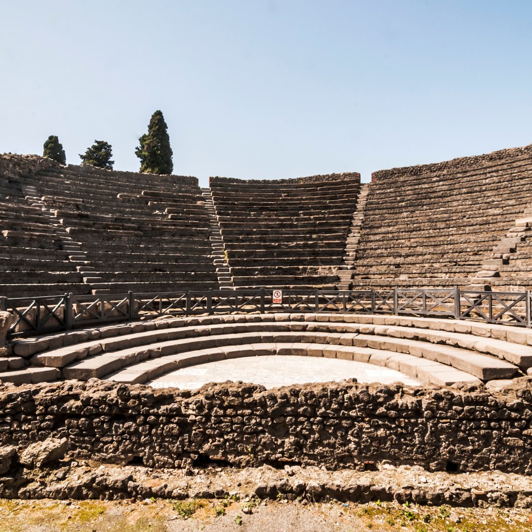 The Odeon, the small covered theatre of Pompeii, with its semicircular stone seating